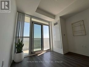 Vaughan (Vaughan Corporate Centre) condo for rent - A room with a large window and a plant in a white pot.