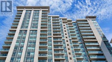 Toronto (Willowdale East) condo for rent - A tall residential building with multiple balconies and windows.