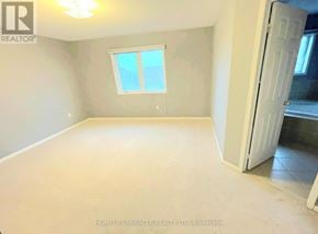 Oshawa (Pinecrest) apartment for rent - A room with a window and a door is for rent.