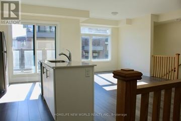 Pickering (Duffin Heights) townhouse for rent - A kitchen with a sink and a window.