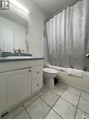 Aurora (Aurora Highlands) apartment for rent - A white bathroom with a toilet and sink.