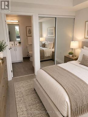 Toronto (Humber Heights) condo for rent - A bedroom with a large bed and a mirrored closet door.