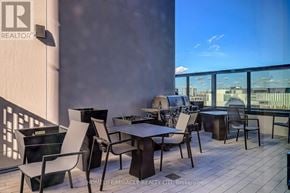Mississauga (City Centre) condo for rent - A balcony with a table and chairs is shown.