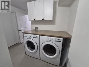 Hamilton apartment for rent - A laundry room with a washer and dryer.
