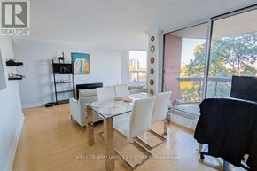 London East (East F) condo for rent - A dining room with a glass table and chairs.