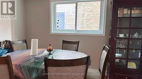 Richmond Hill (South Richvale) apartment for rent - A dining room with a table set for four.
