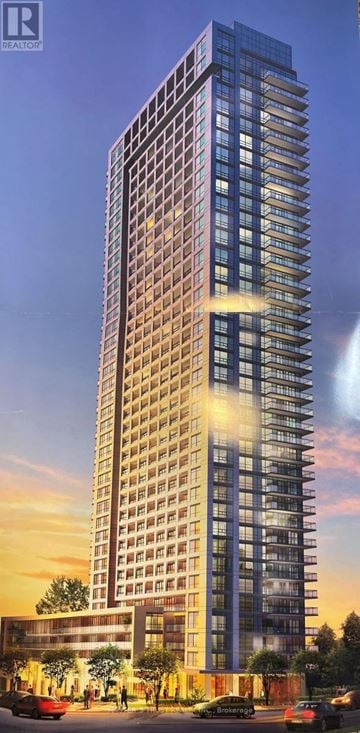 Toronto (Henry Farm) condo for rent - A tall, modern building with many windows is shown in the image.