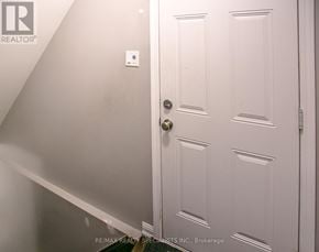 Brampton (Northwest Brampton) apartment for rent - A white door with a silver handle is closed.