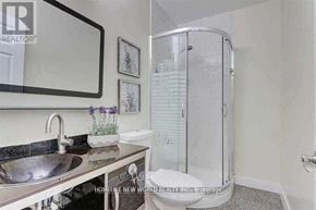 Toronto (Agincourt South-Malvern West) apartment for rent - A bathroom with a sink, mirror, toilet and shower.