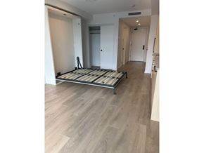 Surrey apartment for rent - A room with a bed frame in it.