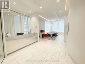 Toronto (Kensington-Chinatown) condo for rent - A spacious living room with a dining table and chairs.