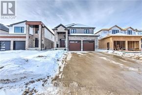 London North (North S) apartment for rent - A real estate company is showcasing a residential area with houses and a construction site.