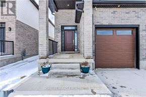 London North (North S) apartment for rent - A house with a brown door and a brown garage door.