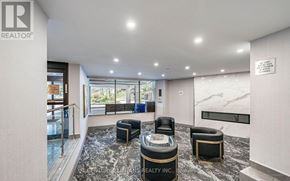 Toronto (Flemingdon Park) condo for rent - A modern office lobby with a glass wall and a reception desk.