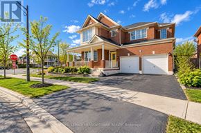 Milton (Be Beaty) apartment for rent - A large house with a driveway in front of it.