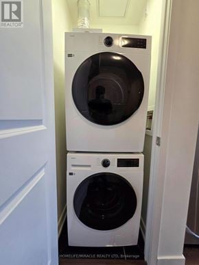 Toronto (Glenfield-Jane Heights) condo for rent - A white washing machine and dryer in a small laundry room.