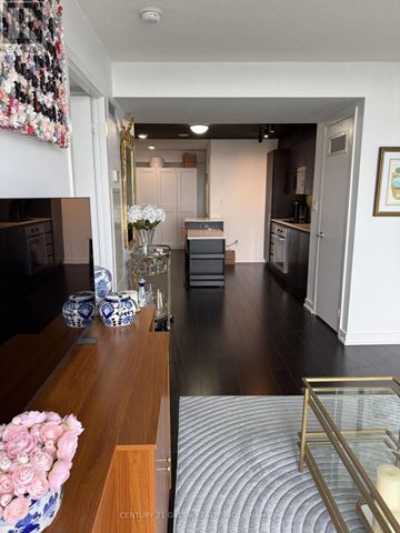 Toronto (Waterfront Communities) condo for rent - A kitchen with a wooden counter and a rug on the floor.