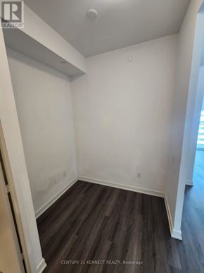 Mississauga (City Centre) condo for rent - A room with white walls and wooden flooring.