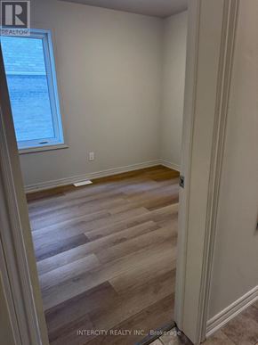 Toronto (Oakwood Village) apartment for rent - A room with wood flooring and a window.