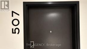 Guelph (St. Patrick's Ward) condo for rent - A black door with the number 507 on the wall above it.