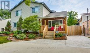 London South (South Y) apartment for rent - A house with a front yard and a deck.