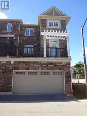 Oakville (Go Glenorchy) townhouse for rent - A two-story house with a garage is for sale.