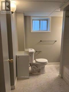 Toronto (West Humber-Clairville) apartment for rent - A small bathroom with a toilet and a bidet.
