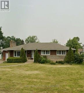 Welland (Dain City) apartment for rent - A house with a lawn in front of it.