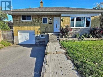 Burlington (Mountainside) apartment for rent - A house with a white door and windows is for sale.