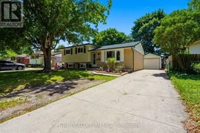 London East (East C) apartment for rent - A residential area with houses and a realtor sign.