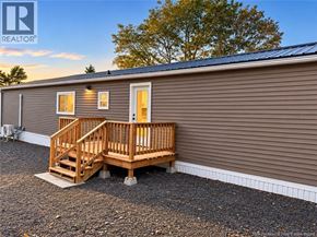 Bethel apartment for rent - A small house with a wooden deck in front.