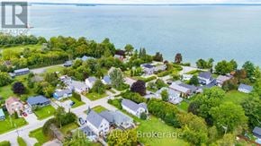 Georgina (Historic Lakeshore Communities) apartment for rent - A bird's eye view of a residential area with houses and greenery.