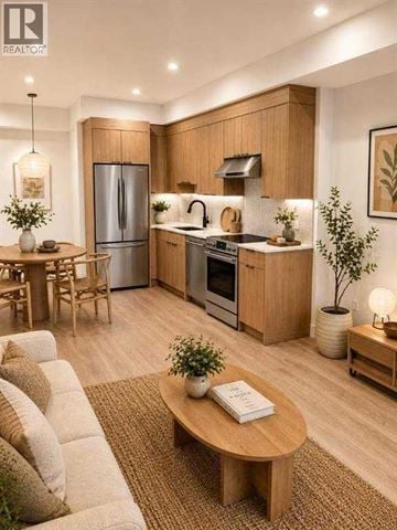 Calgary apartment for rent - A modern kitchen with wooden cabinets and a refrigerator.