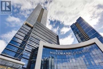 Toronto (Willowdale East) condo for rent - The Hullmark Centre is a tall building with a glass facade.