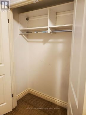 Toronto (Englemount-Lawrence) apartment for rent - A white closet with shelves and a door.