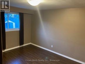 Toronto (Woburn) apartment for rent - A room with Crown North Realty Inc. logo and Brokerage written on the wall.