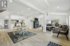 Fort Erie (Crystal Beach) apartment for rent - A spacious living room with a dining table and chairs.