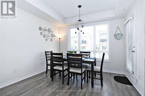 Vaughan (Maple) townhouse for rent - A dining room with a table set for four.
