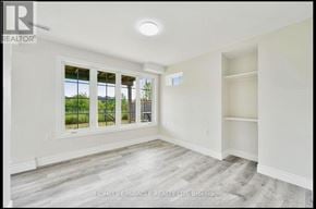 Brampton (Northwest Brampton) apartment for rent - A room with a window and a wall-mounted shelf.