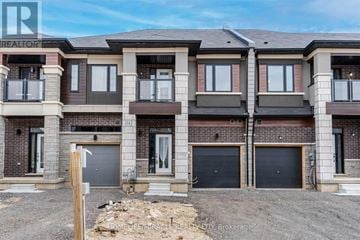 Brantford townhouse for rent - A row of new townhouses with garages are for sale.