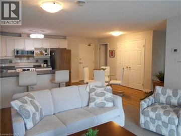Port Dover condo for rent - A living room with a couch and chairs.