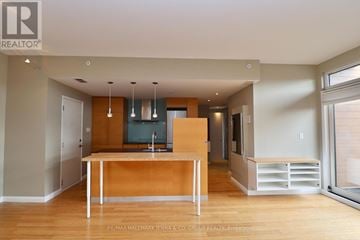 Ottawa triplex for rent - A kitchen with a sink and a counter.
