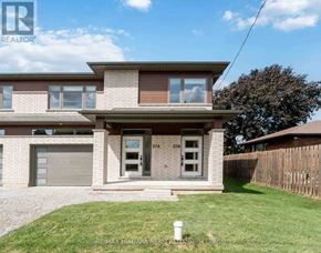 St. Catharines (Carlton/Bunting) apartment for rent - A two-story house with a garage is for sale.