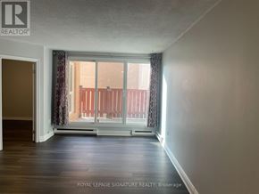 Toronto (Morningside) townhouse for rent - A room with a sliding glass door leading to a balcony.
