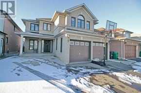 Brampton (Sandringham-Wellington) apartment for rent - A large house with a basketball hoop in the driveway.