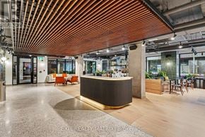 Ottawa apartment for rent - A reception area with a wooden ceiling and a reception desk.