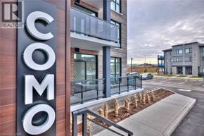 Stoney Creek condo for rent - A modern building with the word "COMO" on the side.