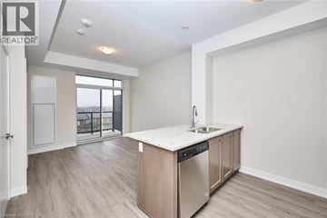 Stoney Creek condo for rent - A kitchen area with a sink and a dishwasher.