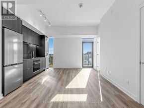 Hamilton (Beasley) condo for rent - A modern kitchen with stainless steel appliances and wooden flooring.