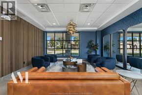 Windsor condo for rent - A real estate office with a brown and blue theme.